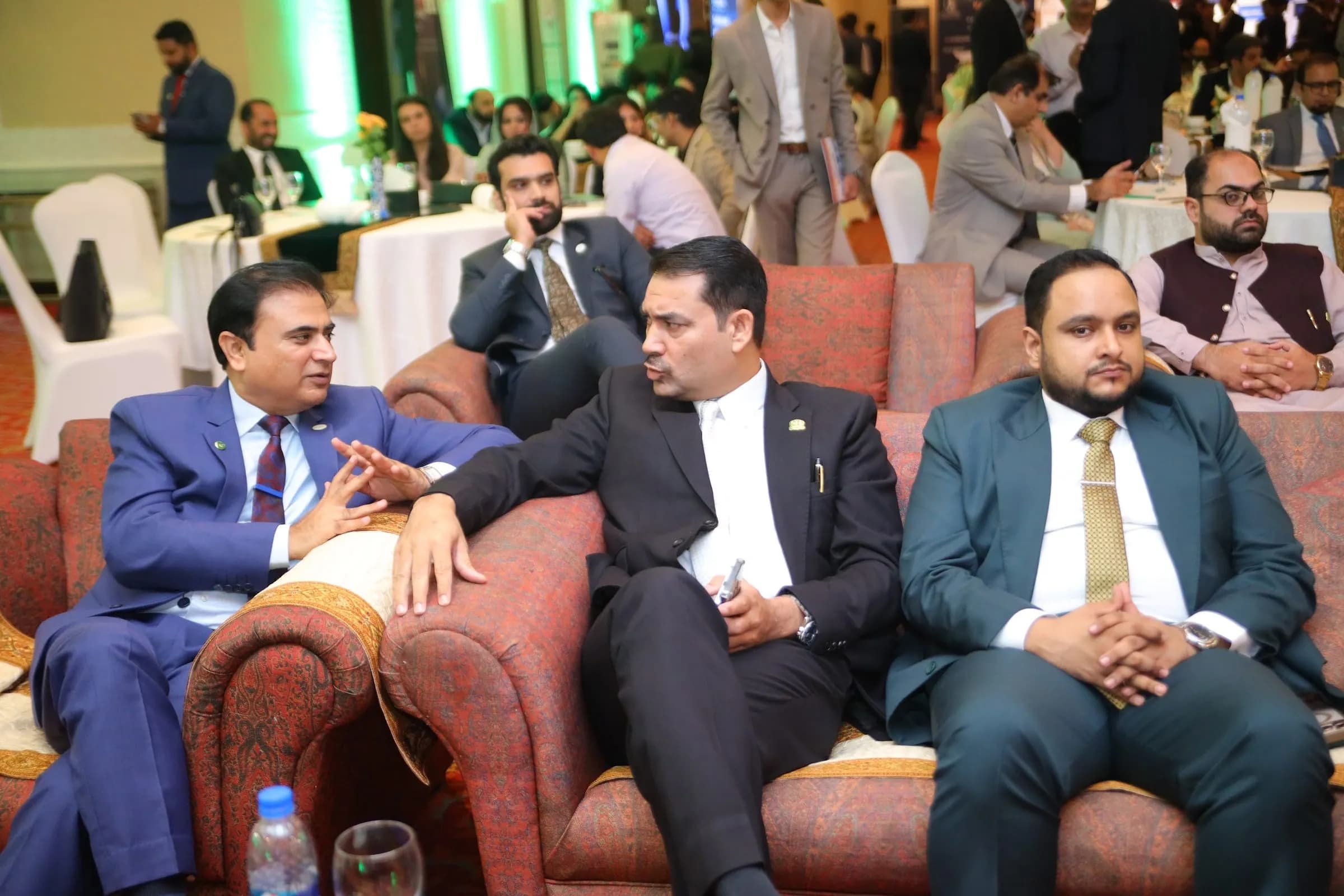 Business leaders talking in the front-row lounge at PBLS Serena Islamabad