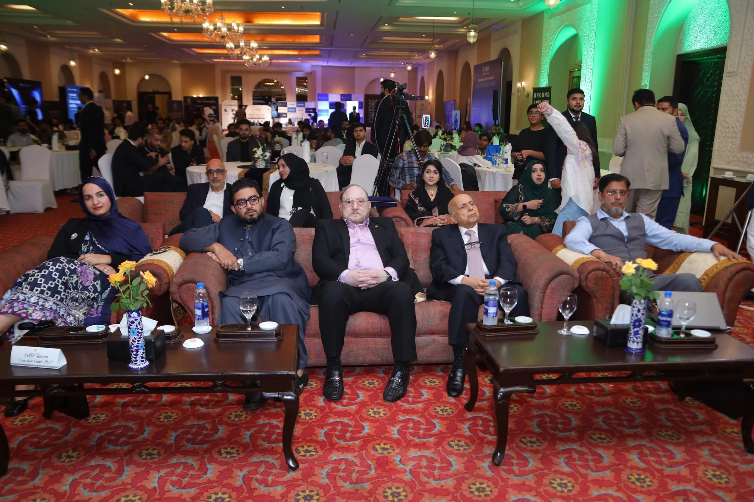 Senior guests seated in the front-row lounge during a session at PBLS Serena Islamabad